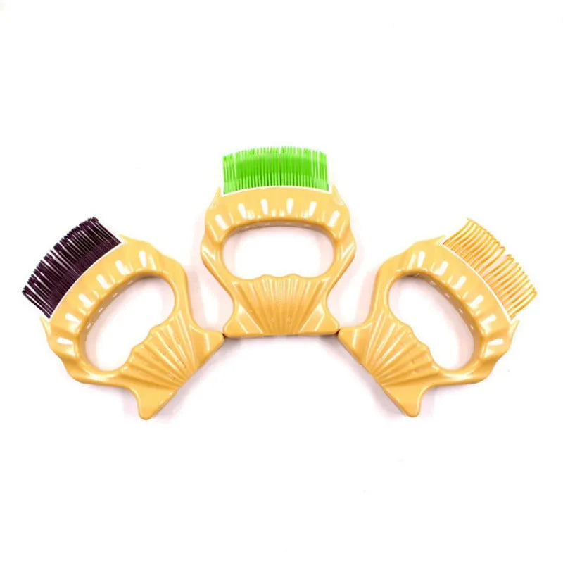 Green shell-shaped pet grooming comb with bent wire bristles and a plastic handle.
