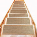 Japanese-style solid-colour linen stair mat with rubber backing on a wooden step.