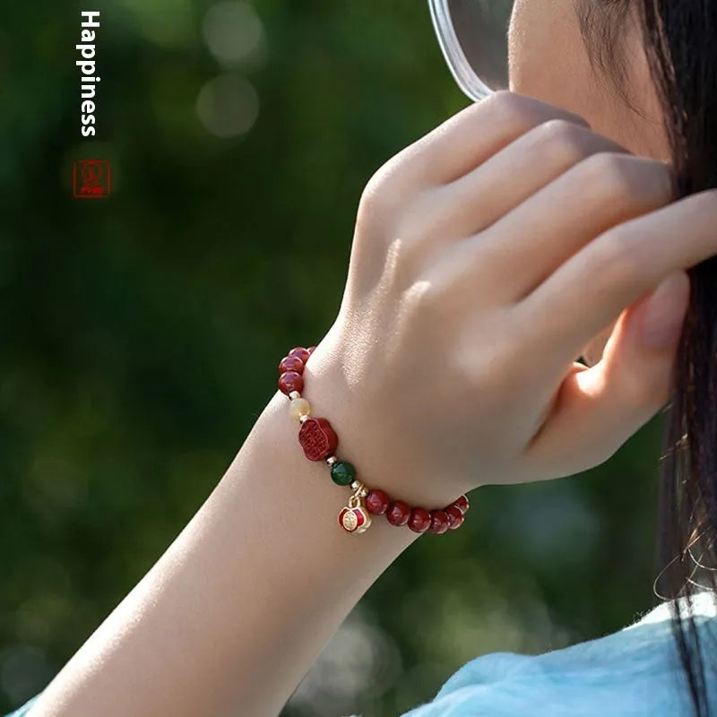 Emperor sandstone bracelet with fu character charm in 6mm and 8mm size options.