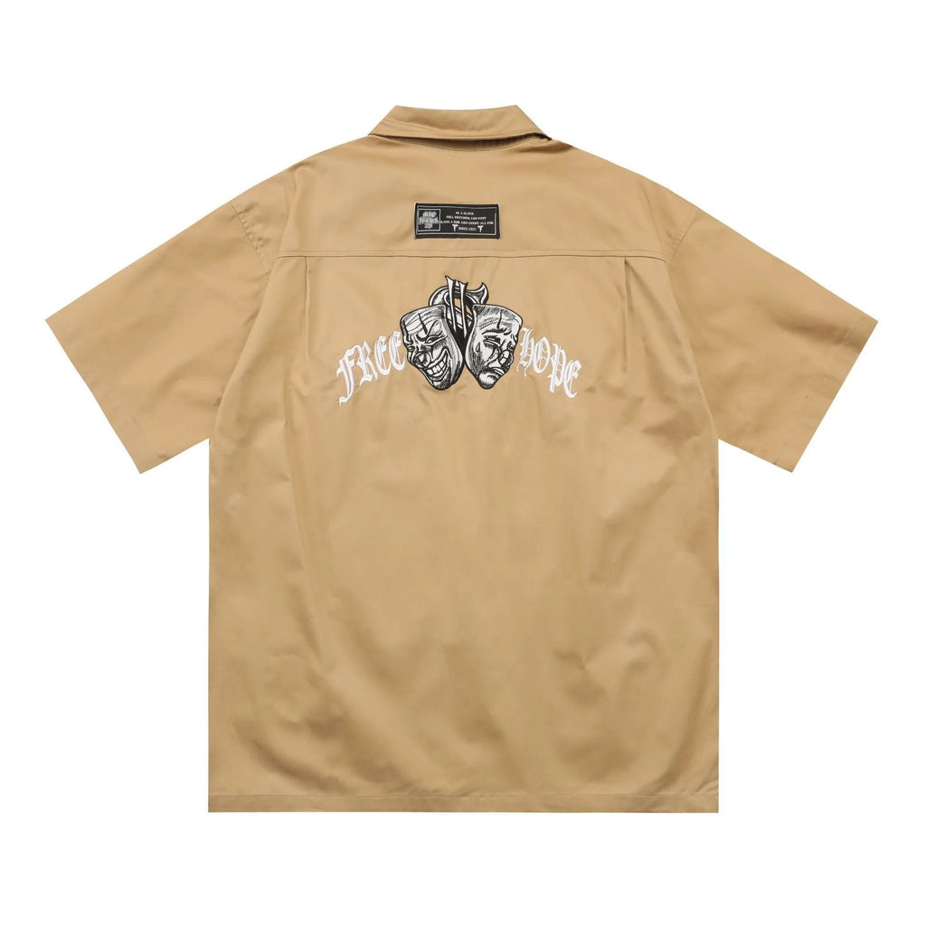 Men's black cotton blend loose fit shirt with half sleeves and embroidered detail.