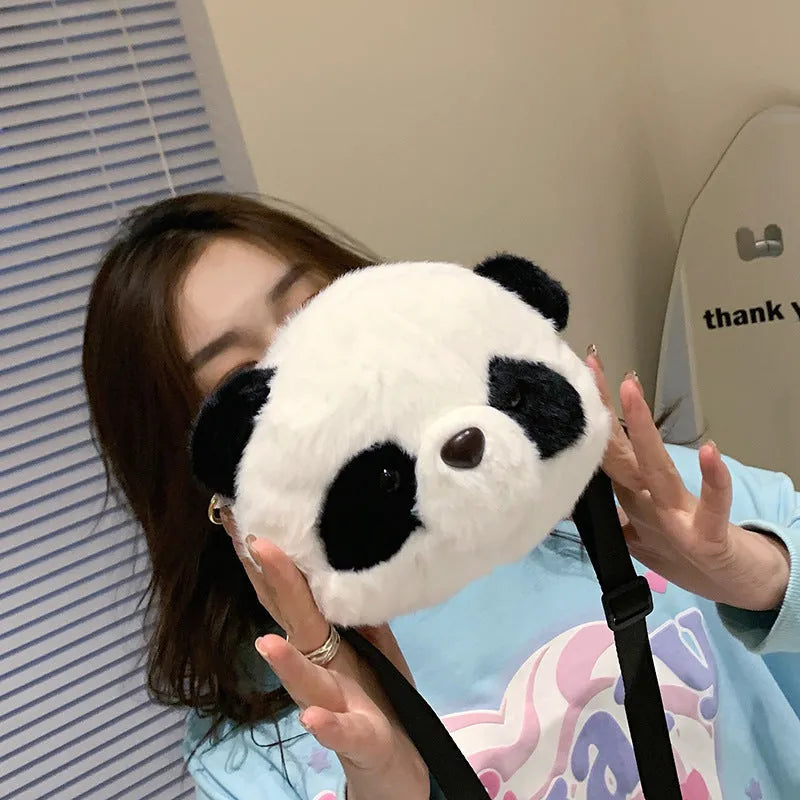Plush cylindrical crossbody bag with panda head design measuring 18×15×8cm