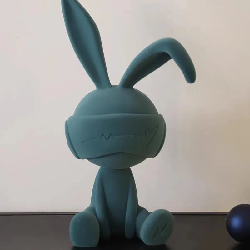 Resin rabbit table ornament with suede blindfold in blue, green or red colour options