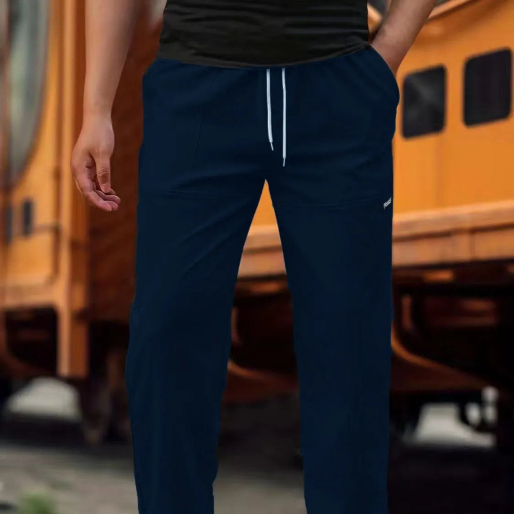 Men's slim fit polyester casual trousers in light gray colour on a hanger.