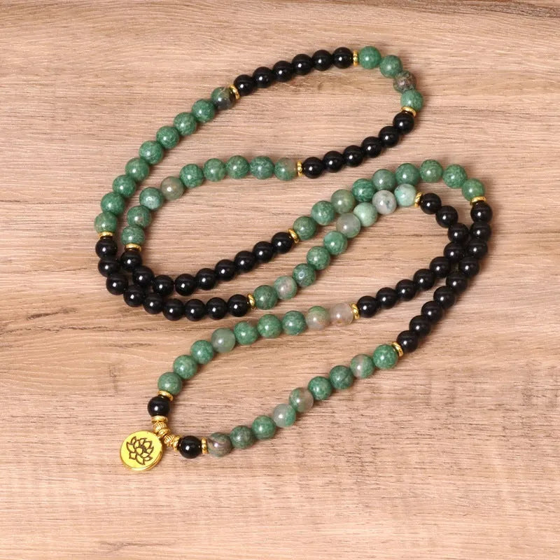 Green and black elastic beaded bracelet with alloy construction and natural style