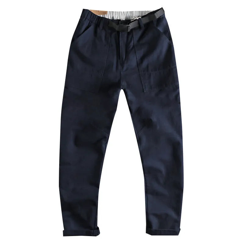 Men's cotton work trousers with NI buckle belt in khaki colour showing three-dimensional cutting detail