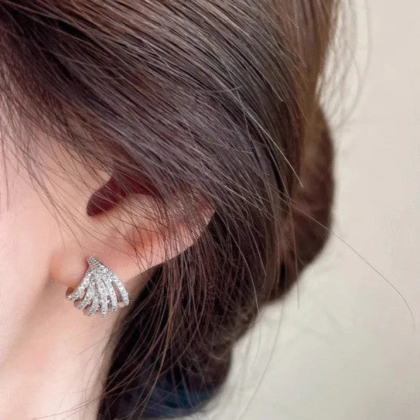 Platinum-coloured geometric zircon earrings with clean line design and electroplated finish