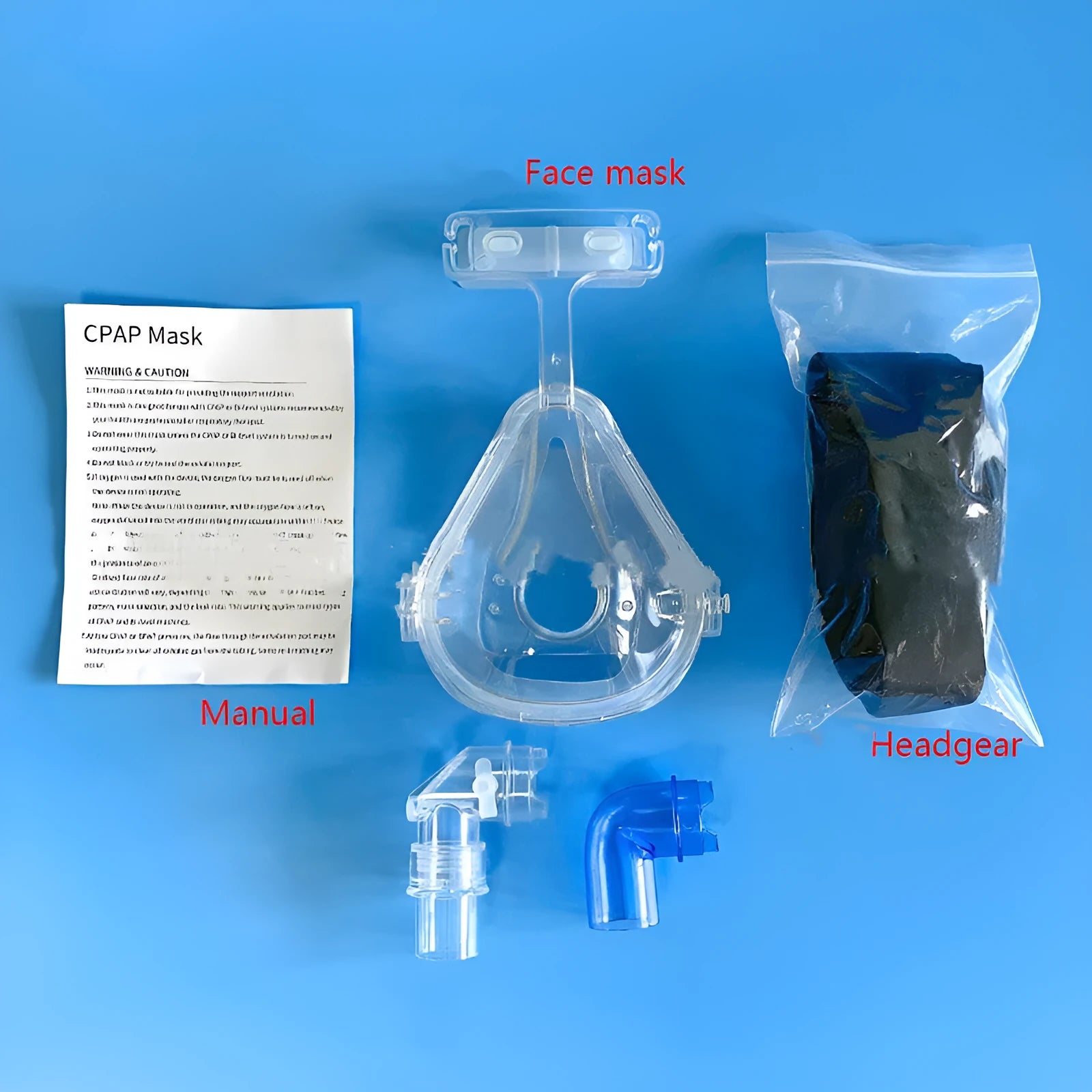 Transparent CPAP breathing mask with silicone and PC materials, headgear, and adapter elbows.