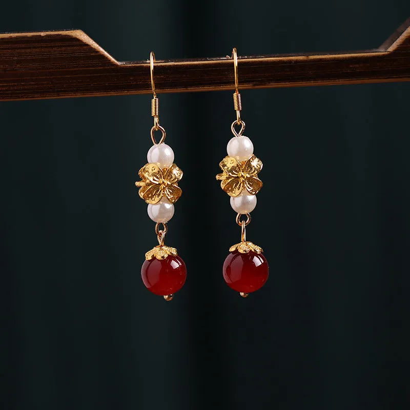 A pair of geometric vintage alloy earrings with an antique design inspired by Han cheongsam court style.