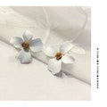 Flower stud earrings for women in pink and white colour options with electroplated alloy construction