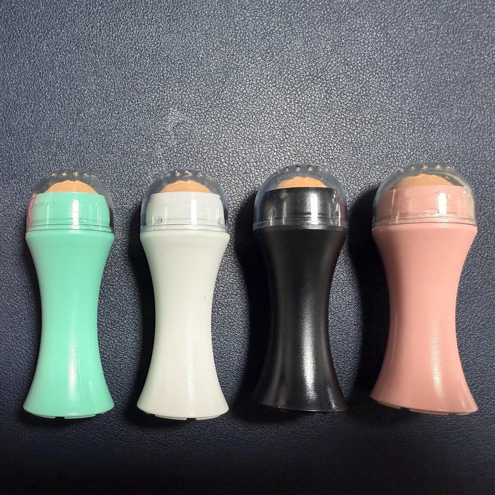 Volcanic stone reusable facial roller for oily skin control in four colours