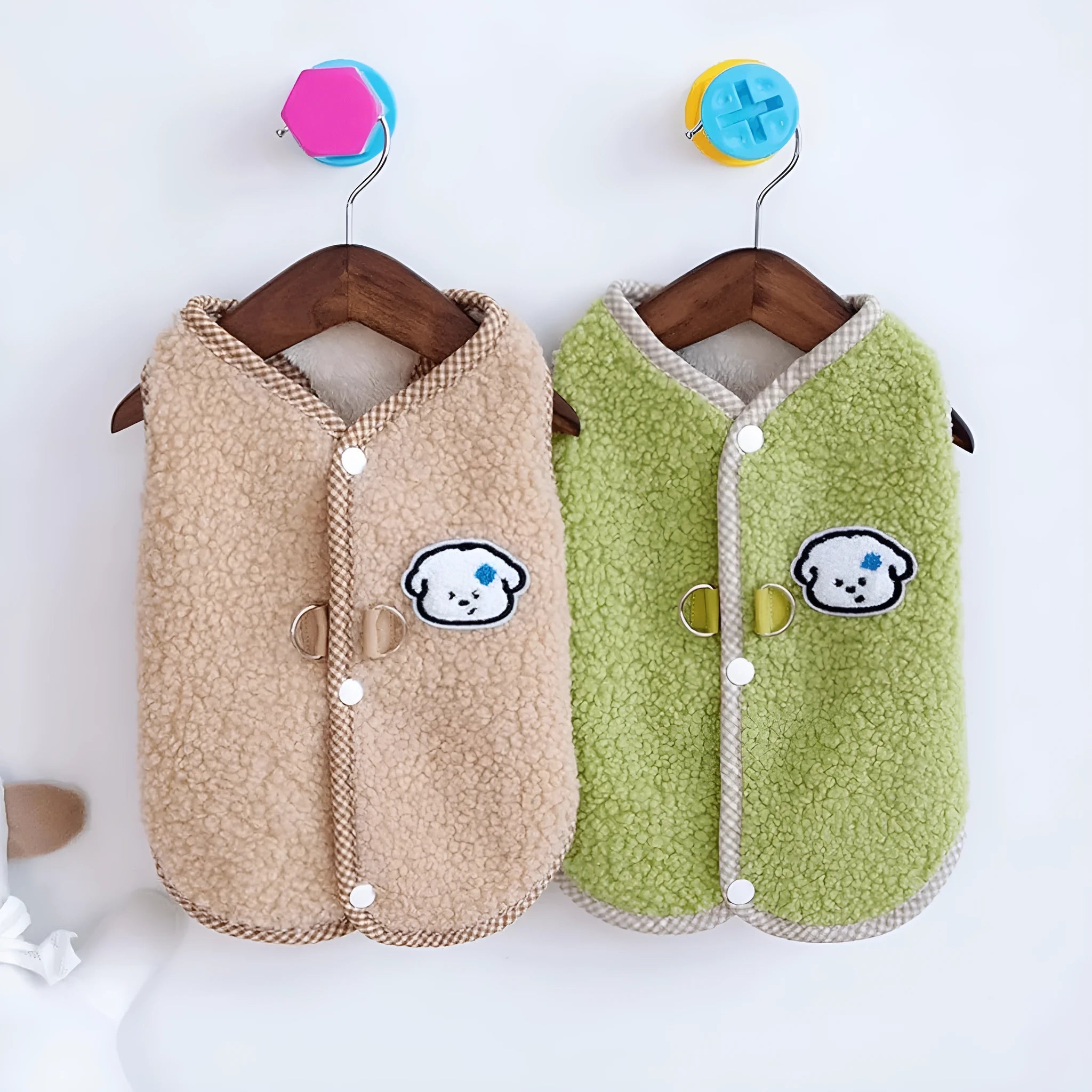 Green coral fleece dog vest with a metal leash ring on the back for a small dog