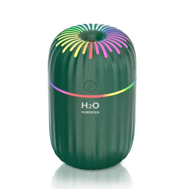 Compact fireworks design USB humidifier in white, pink, or green colours measuring 75x75x116mm