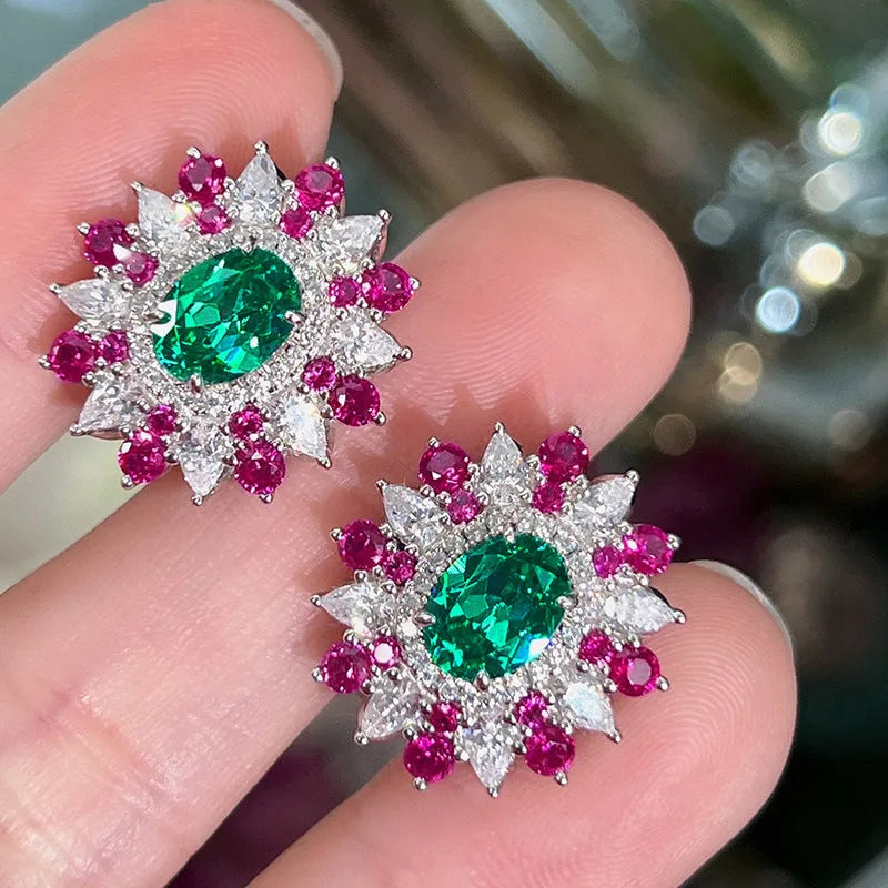 White gold stud earrings with oval zircon stone and geometric floral design on copper base