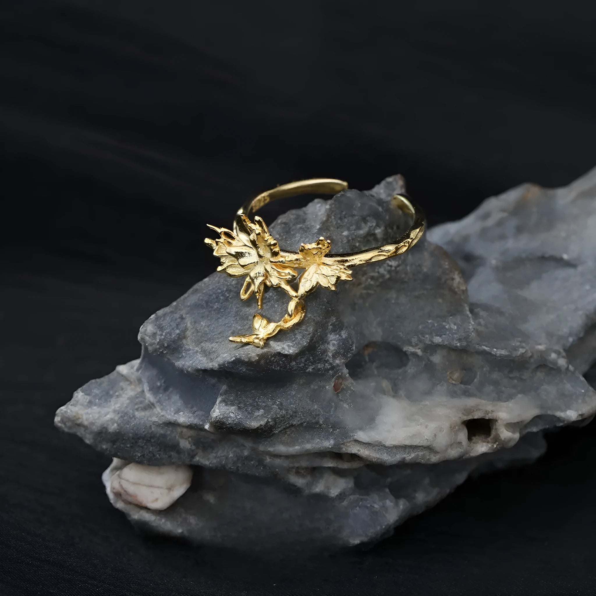 Adjustable silver ring with a detailed wild butterfly design in a white gold or 18K gold colour finish.