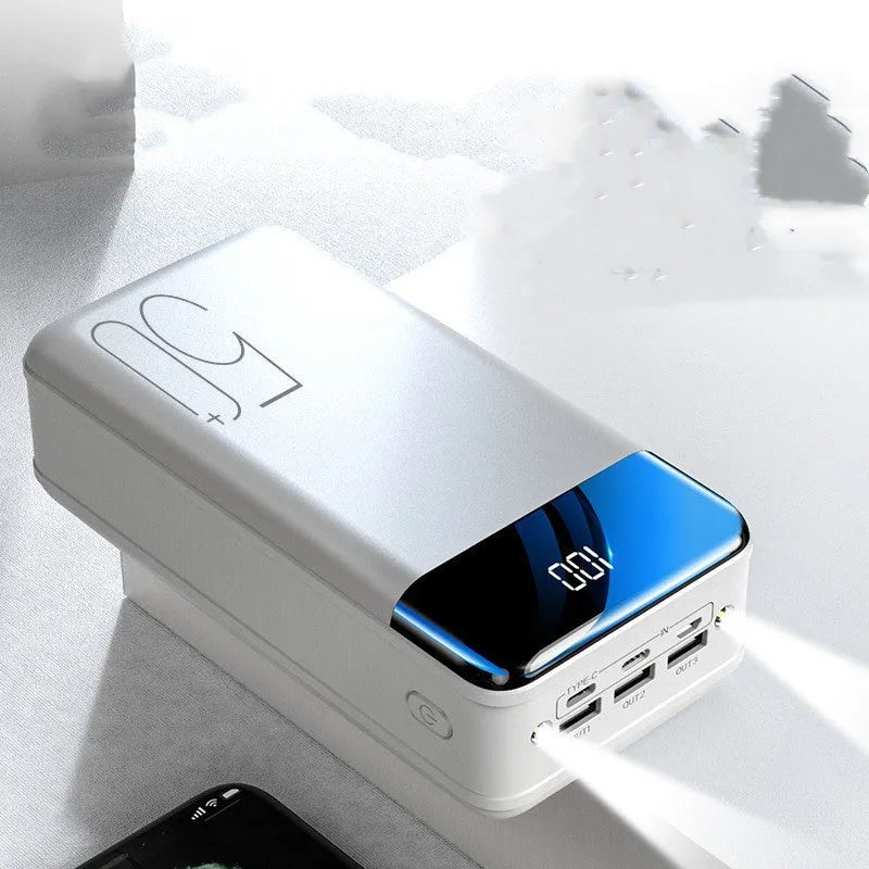 Large 50000mAh capacity power bank with three USB charging ports in black plastic case