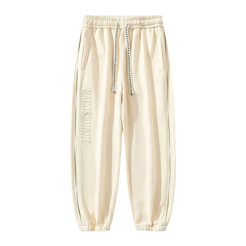 Men's loose cotton pants with ankle banded style and stitching printing details in multiple colours