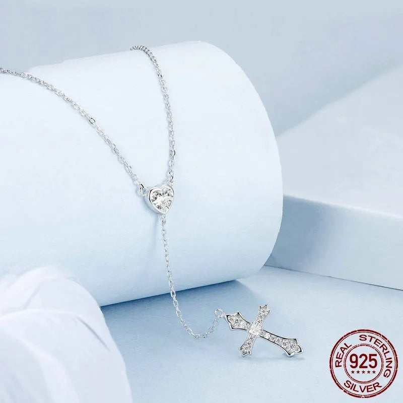 925 sterling silver Love Cross pendant necklace with V-neck design on an O-ring chain.