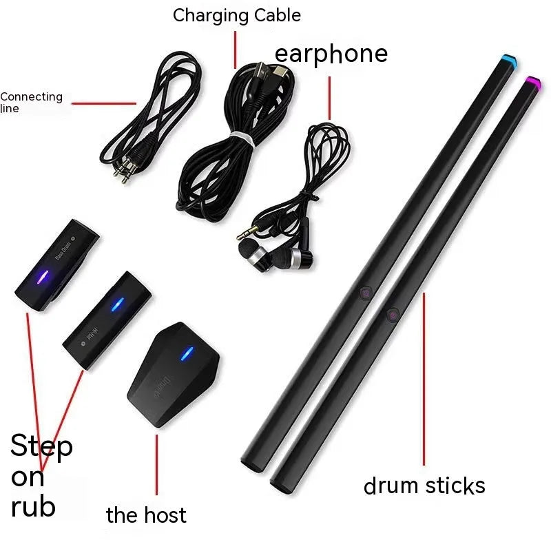 Black wireless air drum kit with drumsticks and step controller on table