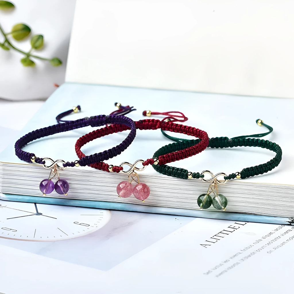 Natural strawberry quartz bracelet with cherry charm and adjustable string closure