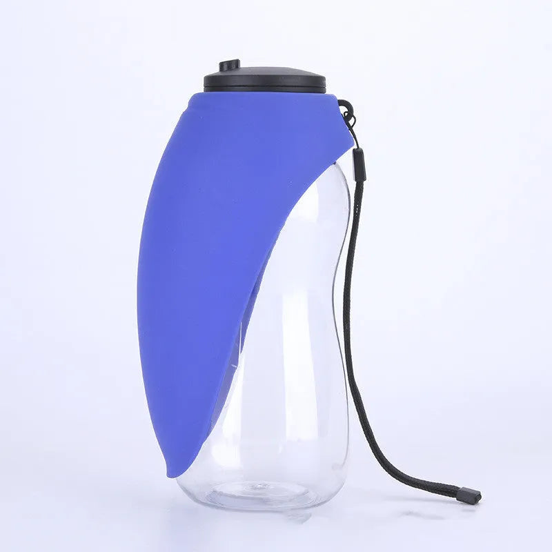 Portable blue dog water bottle with drinking bowl showing key lock mechanism and 680ml capacity markings