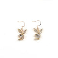 Rabbit stud earrings in silver pink gold colours with cartoon animal design and constellation details