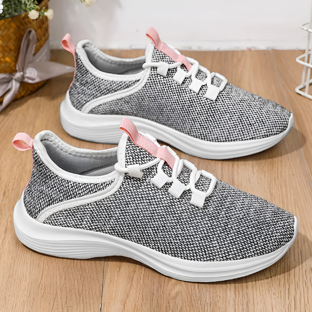 Women's flyknit mesh casual sneakers in black colour with lace-up front and EVA sole