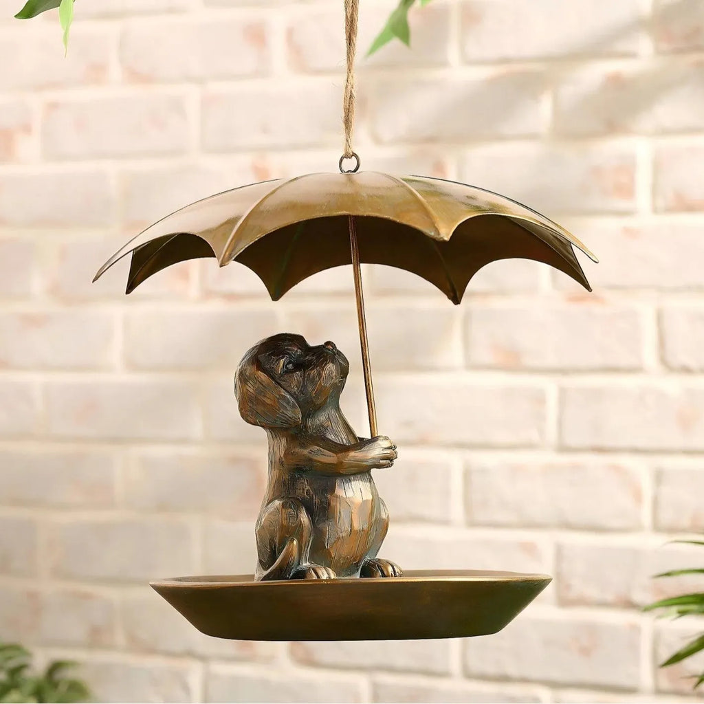 Umbrella shaped bird feeder in cat colour option, 10x10x9cm, casting construction, on a wooden table