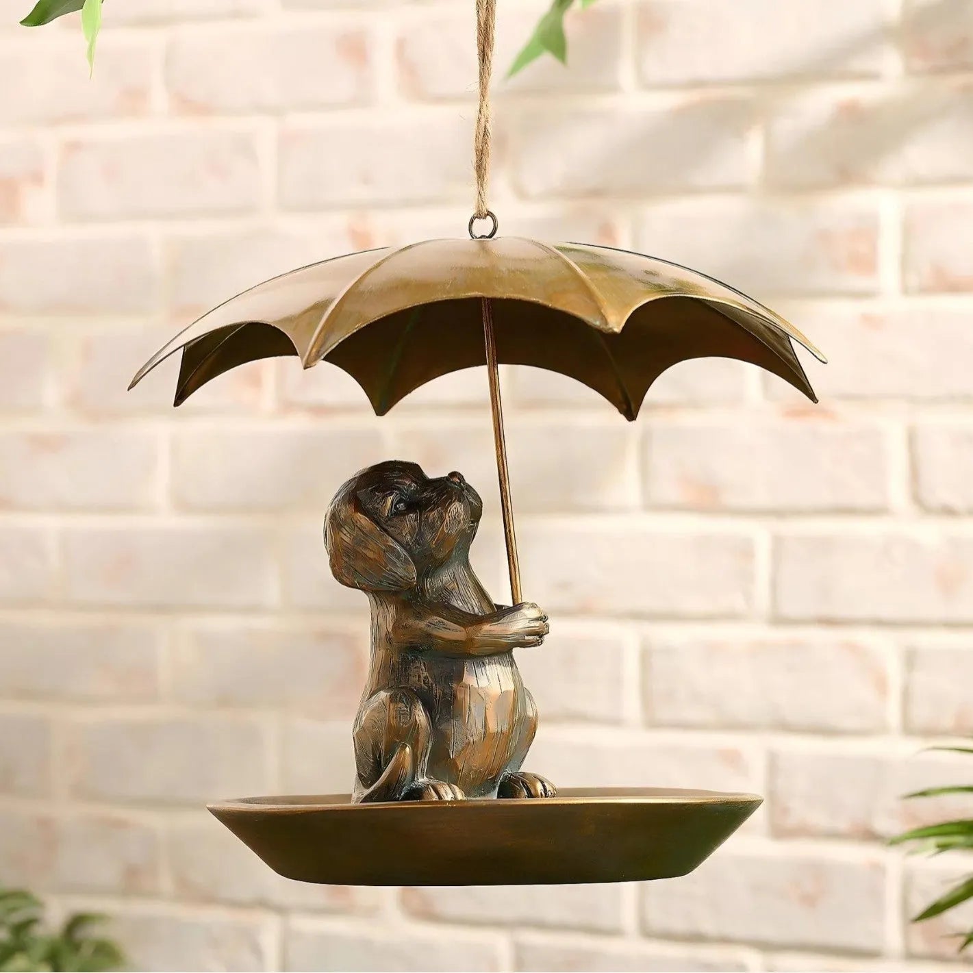 Umbrella shaped bird feeder in cat colour option, 10x10x9cm, casting construction, on a wooden table