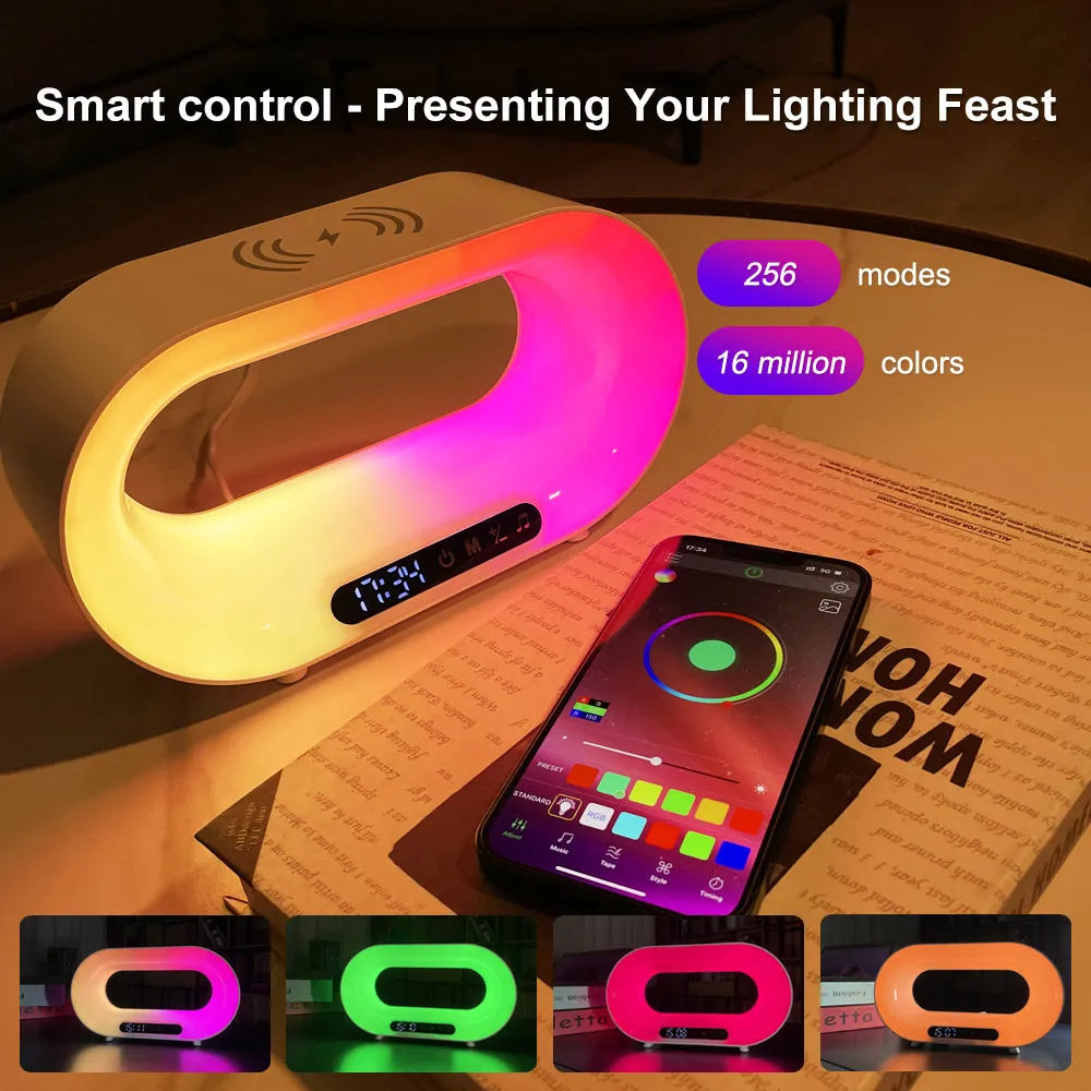 White 3-in-1 LED night light with wireless charger and alarm clock on a bedside table, 23.8cm tall