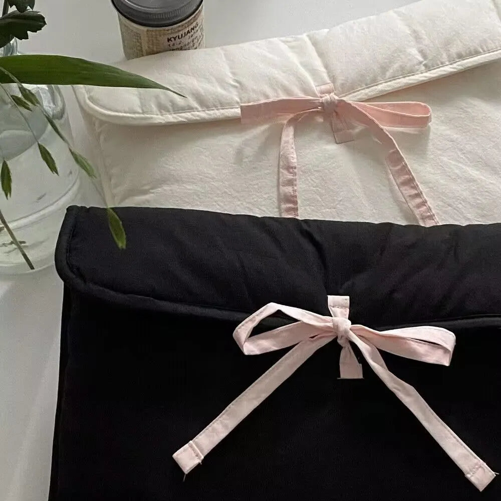 Women's black and white quilted nylon computer bag with ballet bow detail