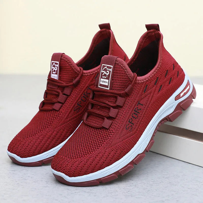 Low-top casual sneaker with a rounded toe and a lightweight PVC sole in multiple colour options.