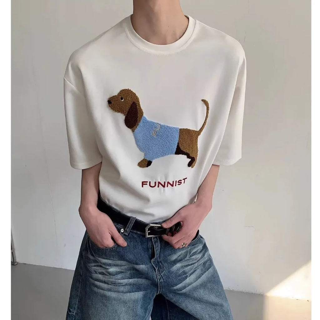 Men's grey cotton t-shirt with embroidered sausage dog and towel design showing round neck and short sleeves