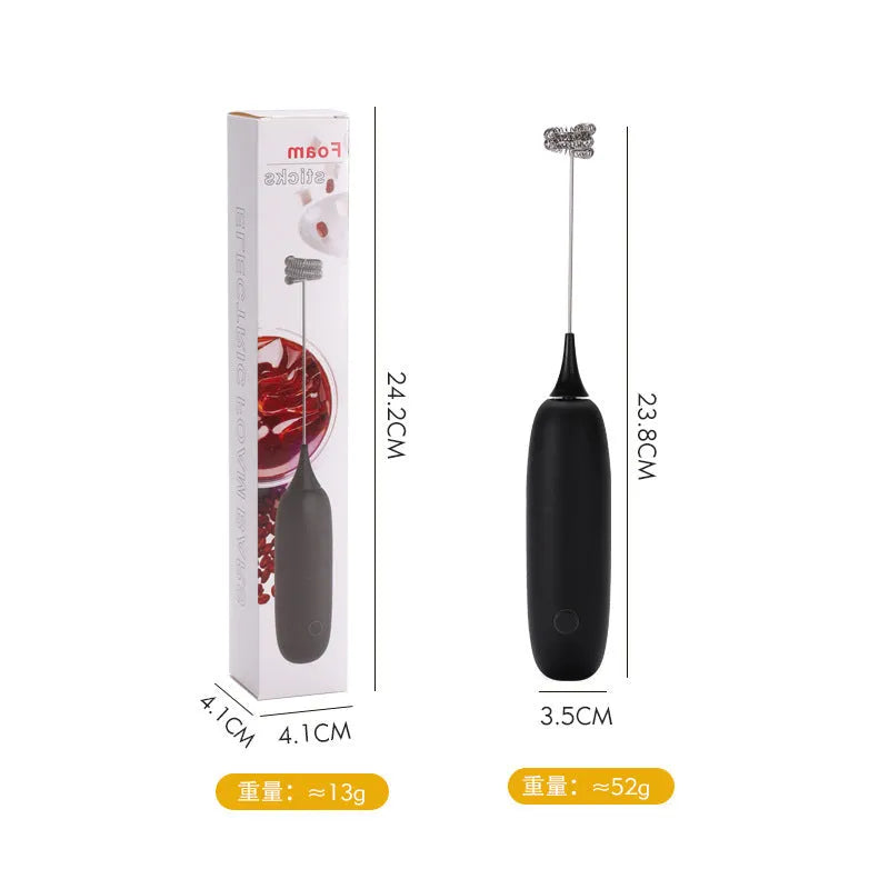 Black and white hand-held electric milk frother blender for coffee preparation