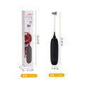 Black and white hand-held electric milk frother blender for coffee preparation