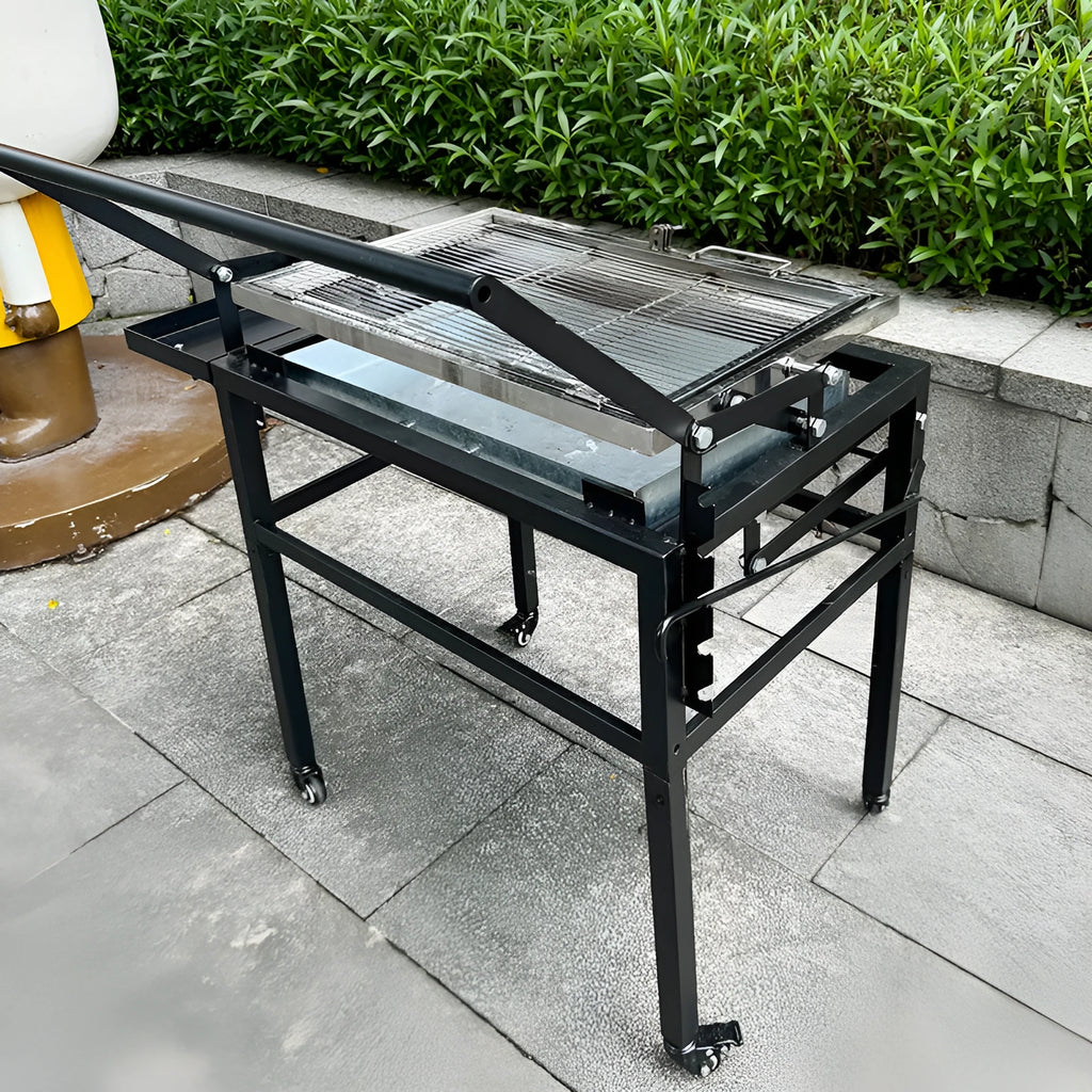 Large foldable Flip BBQ Stove charcoal grill with detachable metal frame set up in a garden.