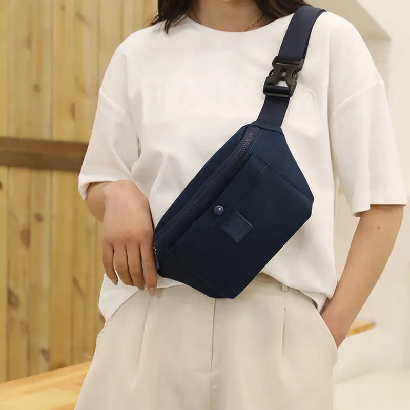 Large capacity crossbody nylon fanny pack for women in eight colours with zipper closure and internal pockets for running and travel