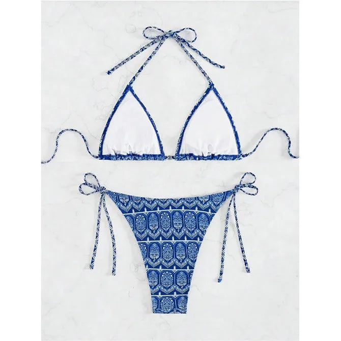 Women's green split bikini swimsuit with bandage-style printed stitching and briefs bottom.