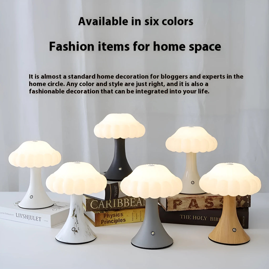Small mushroom-shaped touch night lamp in wood grain colour on a table.