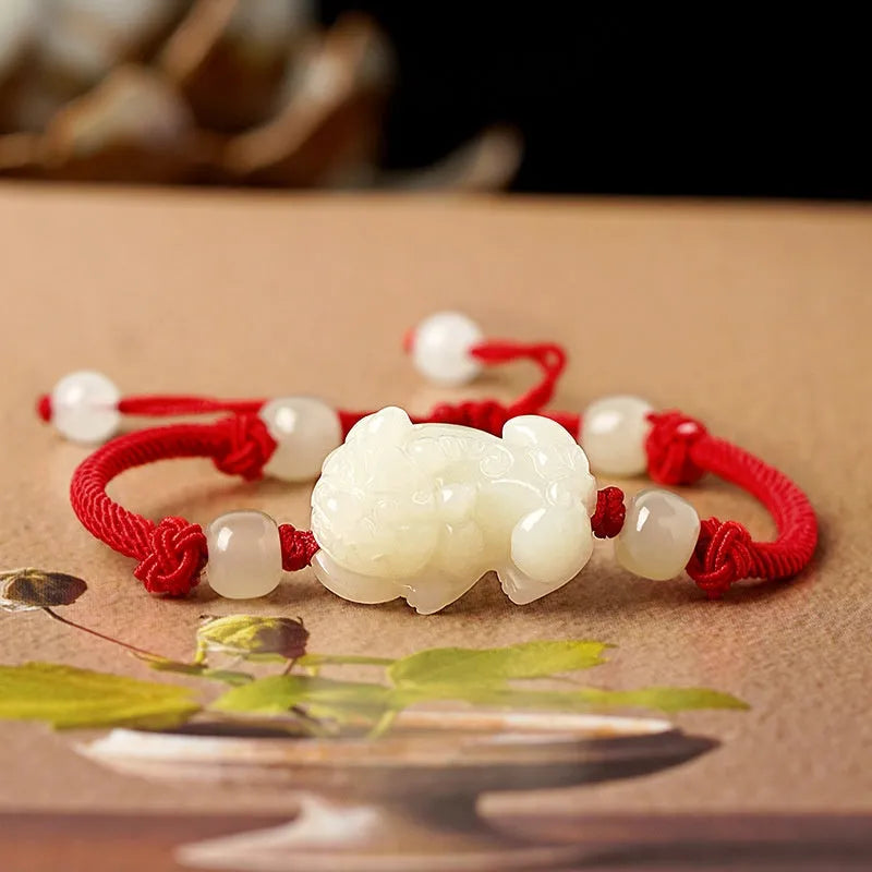 Hetian jade bead bracelet with handmade brown and black braided rope, Chinese style.