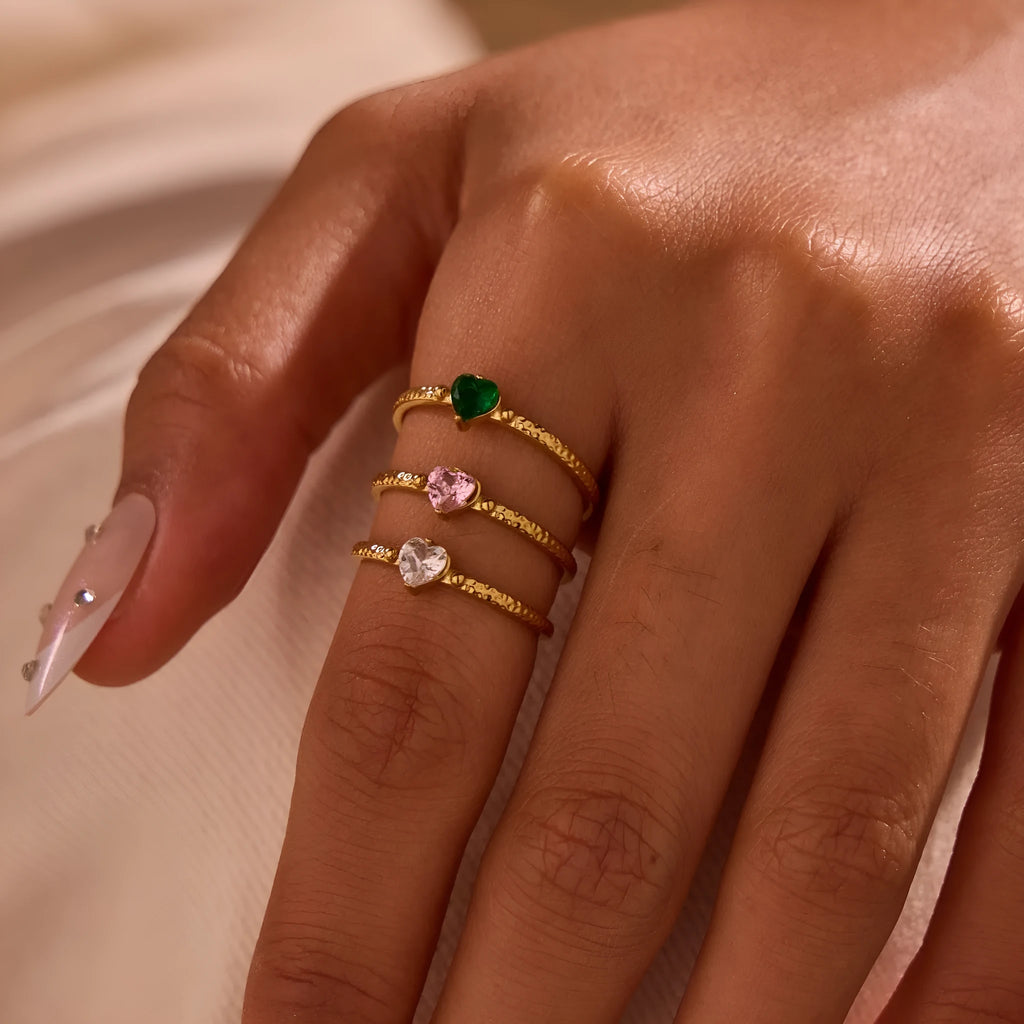 Open-ended stainless steel ring with geometric heart shape and inlaid zircon stones