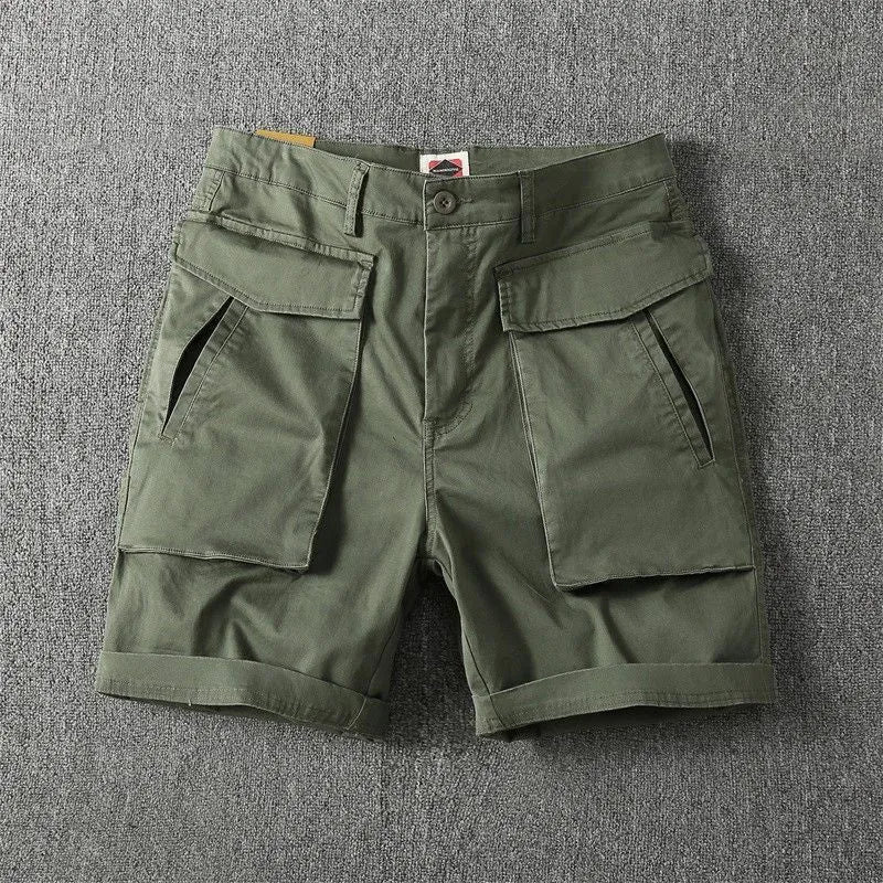 Men's cotton cargo shorts in khaki colour with multiple pockets and a straight leg design.