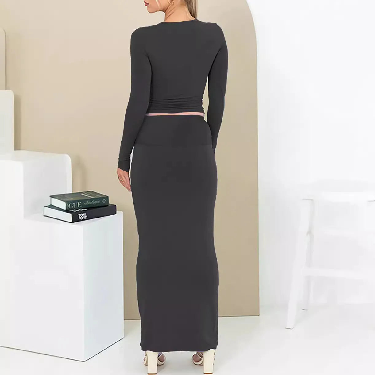 Women's autumn two-piece suit in sweet style, showing three-quarter sleeve top and long skirt.