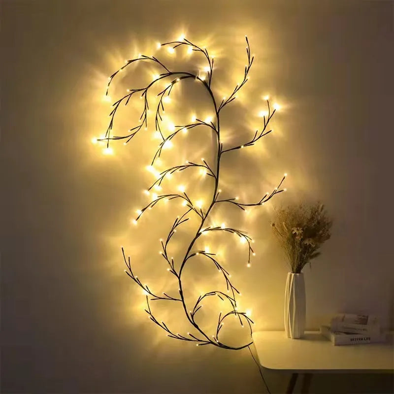 Flexible DIY willow vine LED light garland with warm white lights bent into a decorative shape.