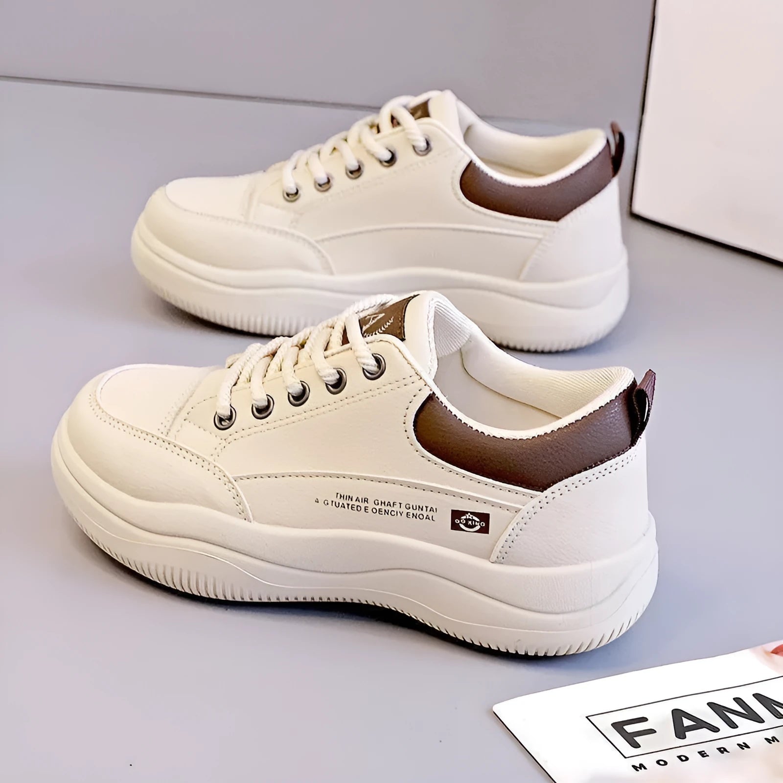 Women's white Korean-style lace-up shoes with cross-strap detailing and round toe