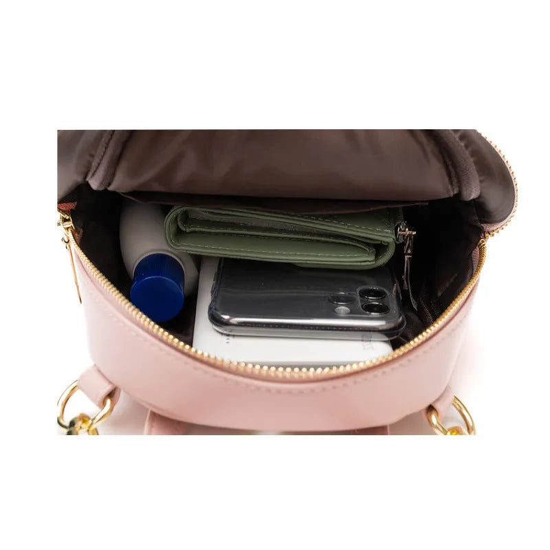 Soft PU mini backpack in street style with 3D pocket, shown in one of six available colours.
