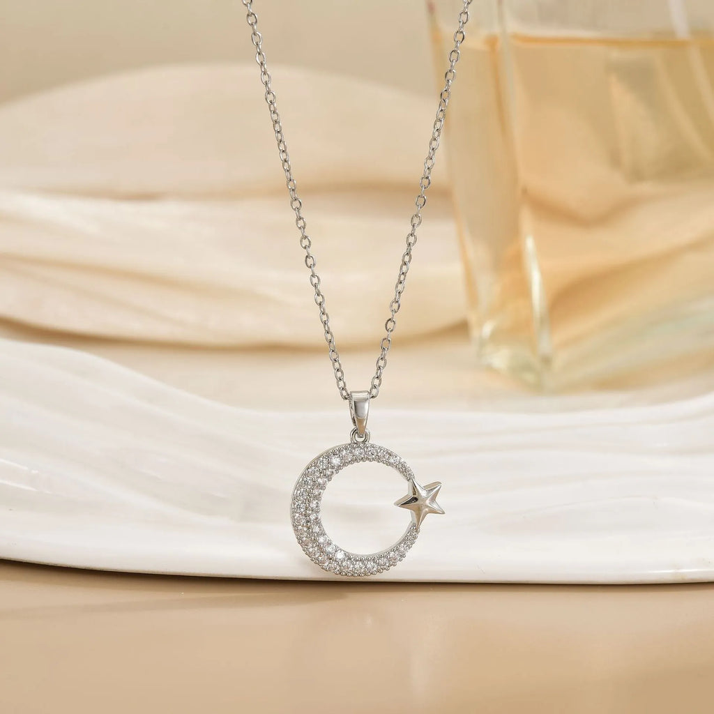 Gold electroplated geometric moon zircon pendant on titanium steel O-ring chain necklace
