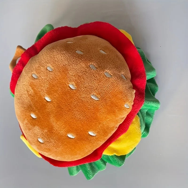 Cat wearing burger headdress collar with cartoon hamburger design and elastic strap