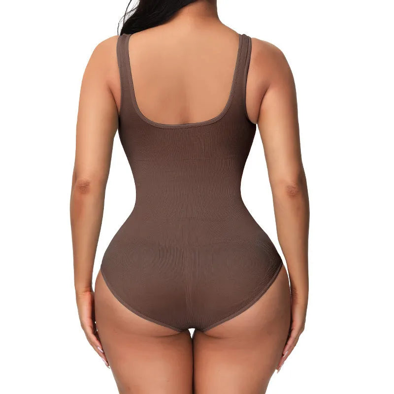 Green seamless nylon women's bodysuit corset laid flat, showing its one-piece shapewear design.