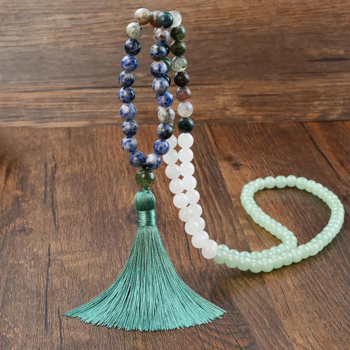 Long 108 natural stone bead necklace with mixed gemstone tassel pendant in bohemian style.