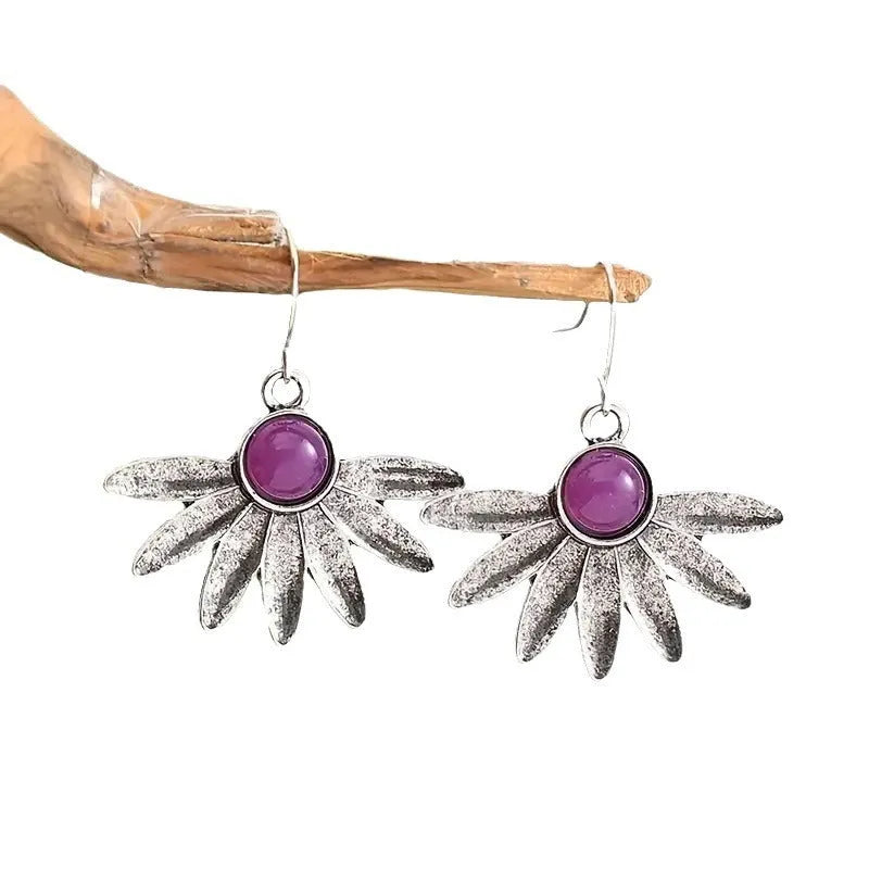 Purple Bohemian style resin gemstone flower earrings with animal zodiac design on alloy background
